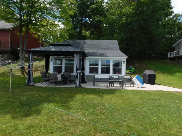 $279,900 | 21660 Brady Lake Boulevard, Morley, MI 49336