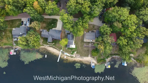 $279,900 | 21660 Brady Lake Boulevard, Morley, MI 49336
