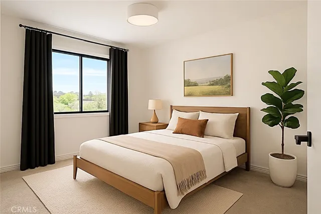 a outdoor living space with patio furniture and a potted plant