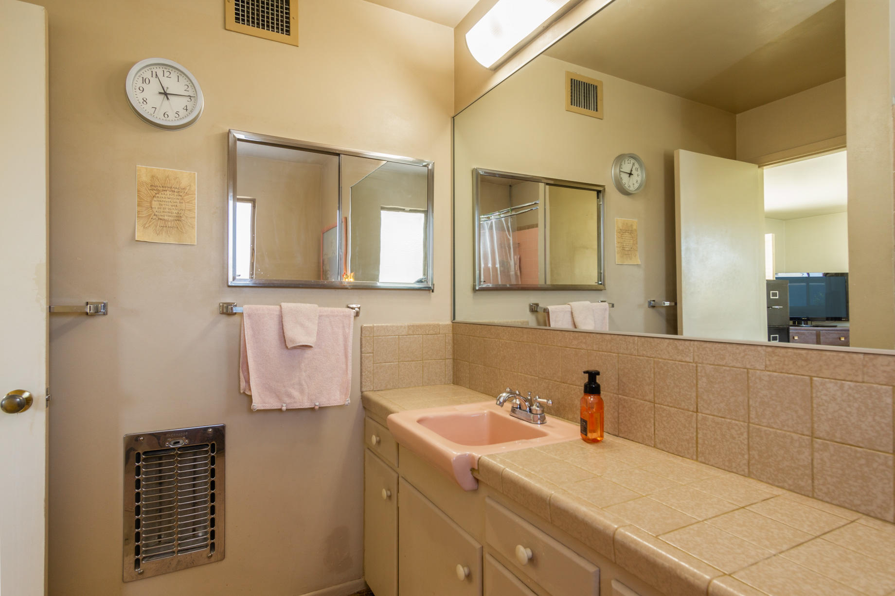 1225 Pasatiempo Road Palm Springs, CA 92262 - Photo 14 of 17 a bathroom with a sink and a mirror