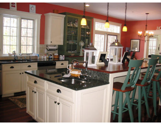 38 Sawmill Ridge Road Haverhill, MA 01832 - Photo 8 of 21 a kitchen with counter top space a sink and cabinets