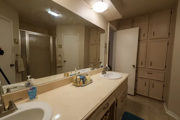 a bathroom with a sink and a mirror