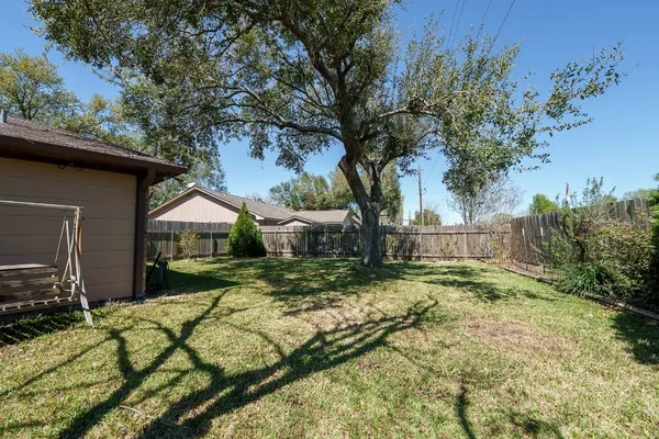 a view of backyard of house