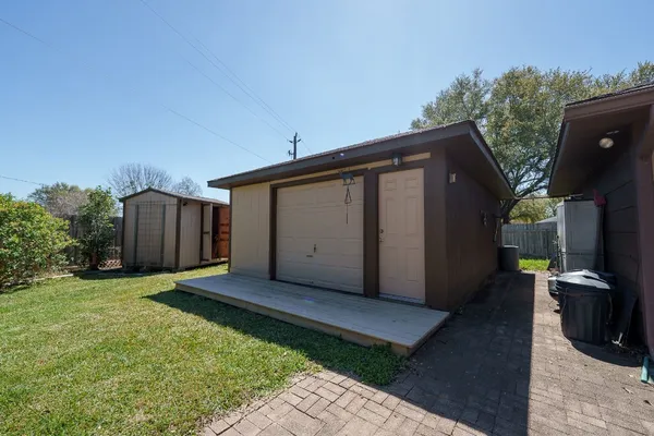 a view of a back yard of the house
