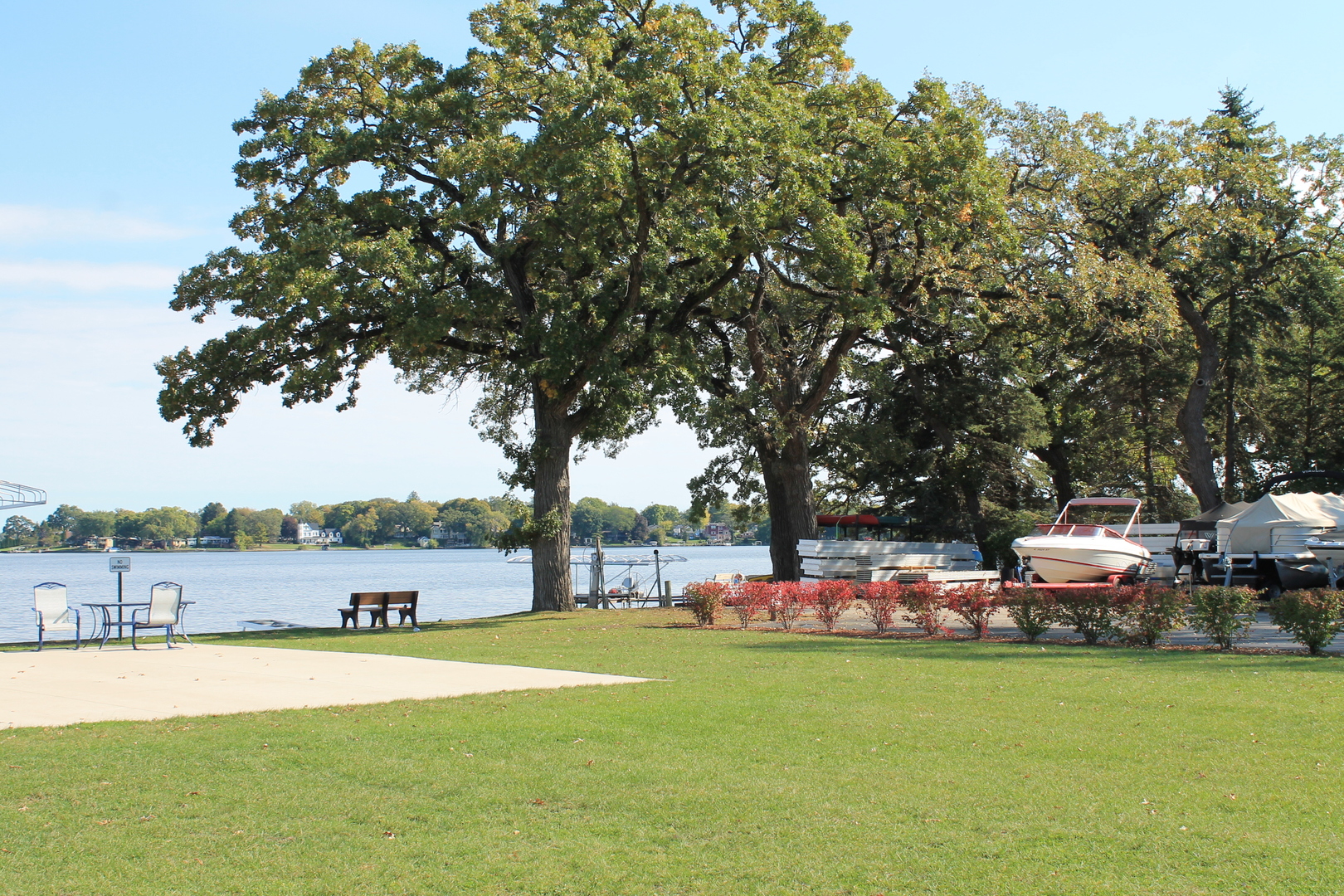 69 White Oaks Road, Unit 69 Fox Lake, IL 60020 - Photo 17 of 18 a front view of a house with garden