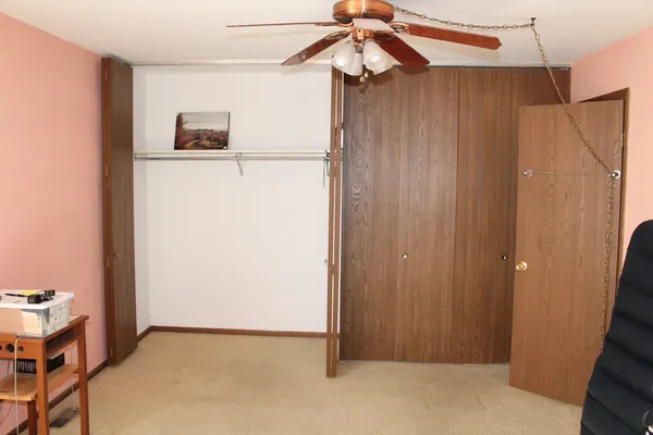a view of a refrigerator in a room
