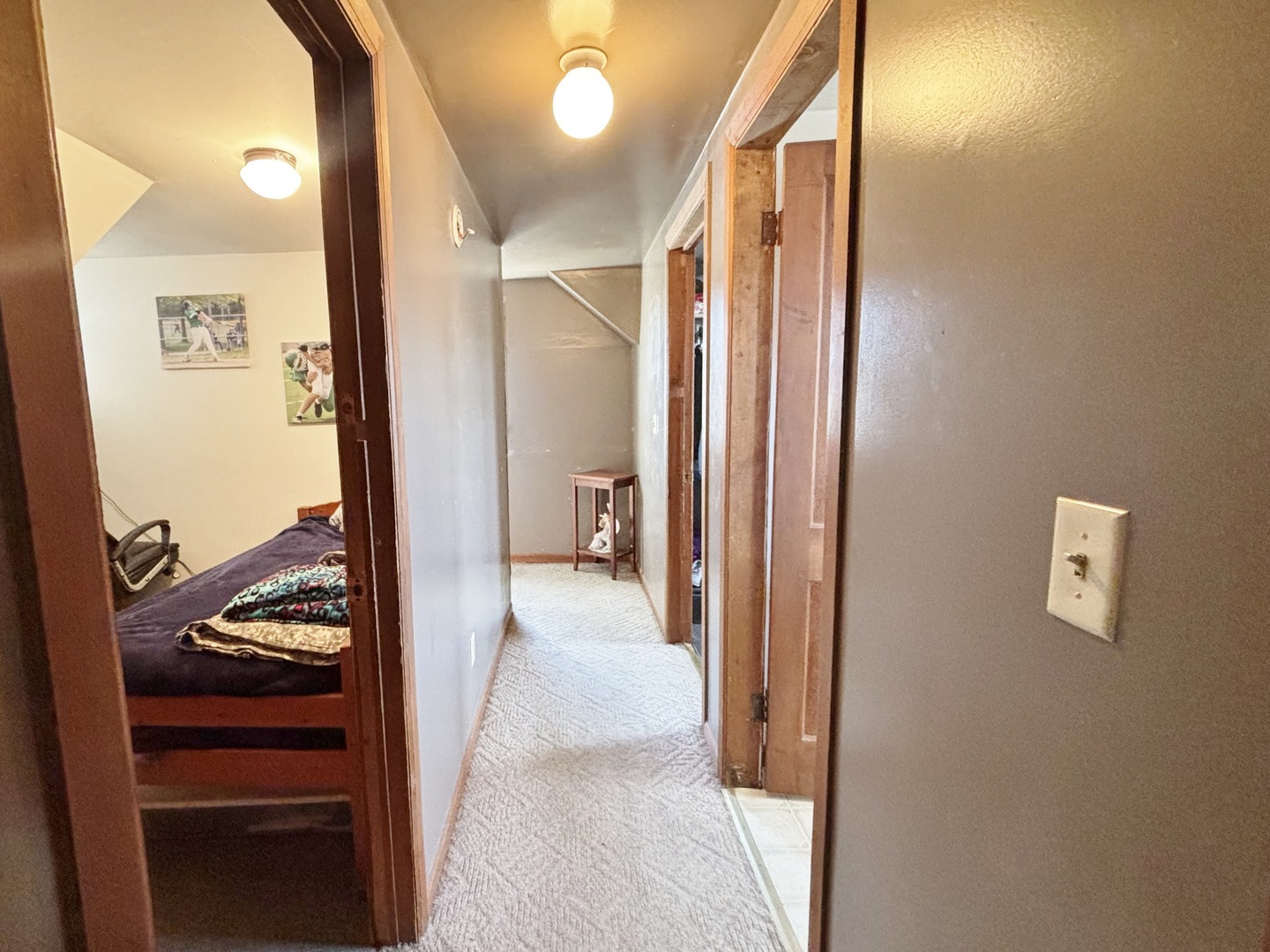 751 21st Street East Moline, IL 61244 - Photo 15 of 21 a view of a hallway and a livingroom with furniture