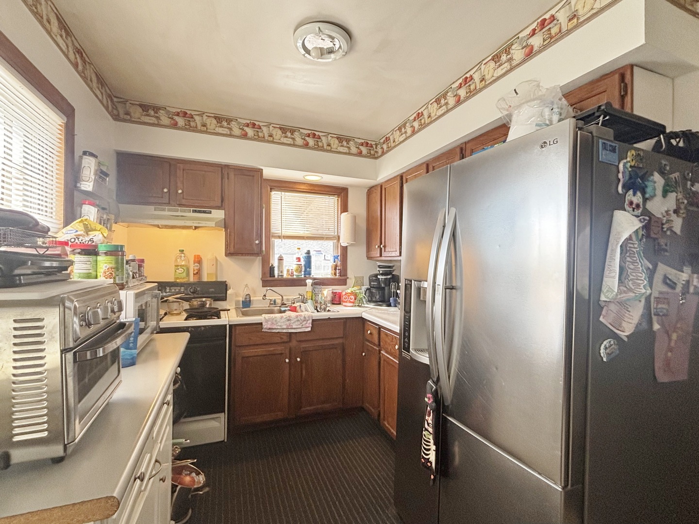 751 21st Street East Moline, IL 61244 - Photo 6 of 21 a kitchen with lots of counter space and refrigerator