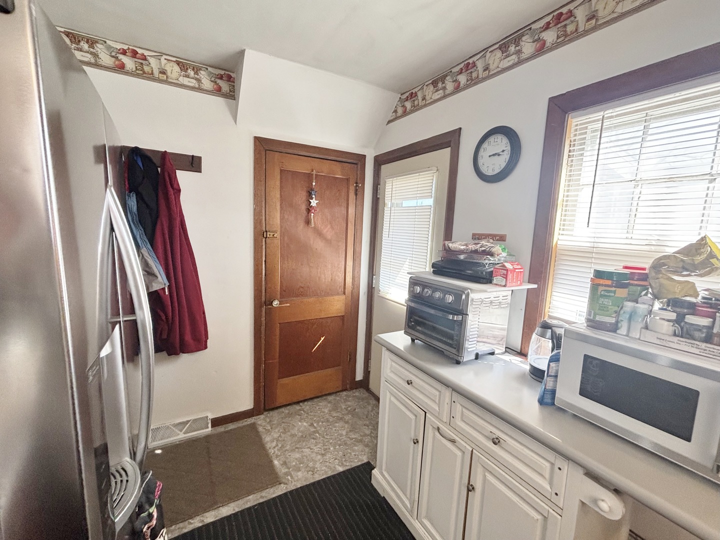 751 21st Street East Moline, IL 61244 - Photo 7 of 21 a kitchen with stainless steel appliances granite countertop a refrigerator and a sink