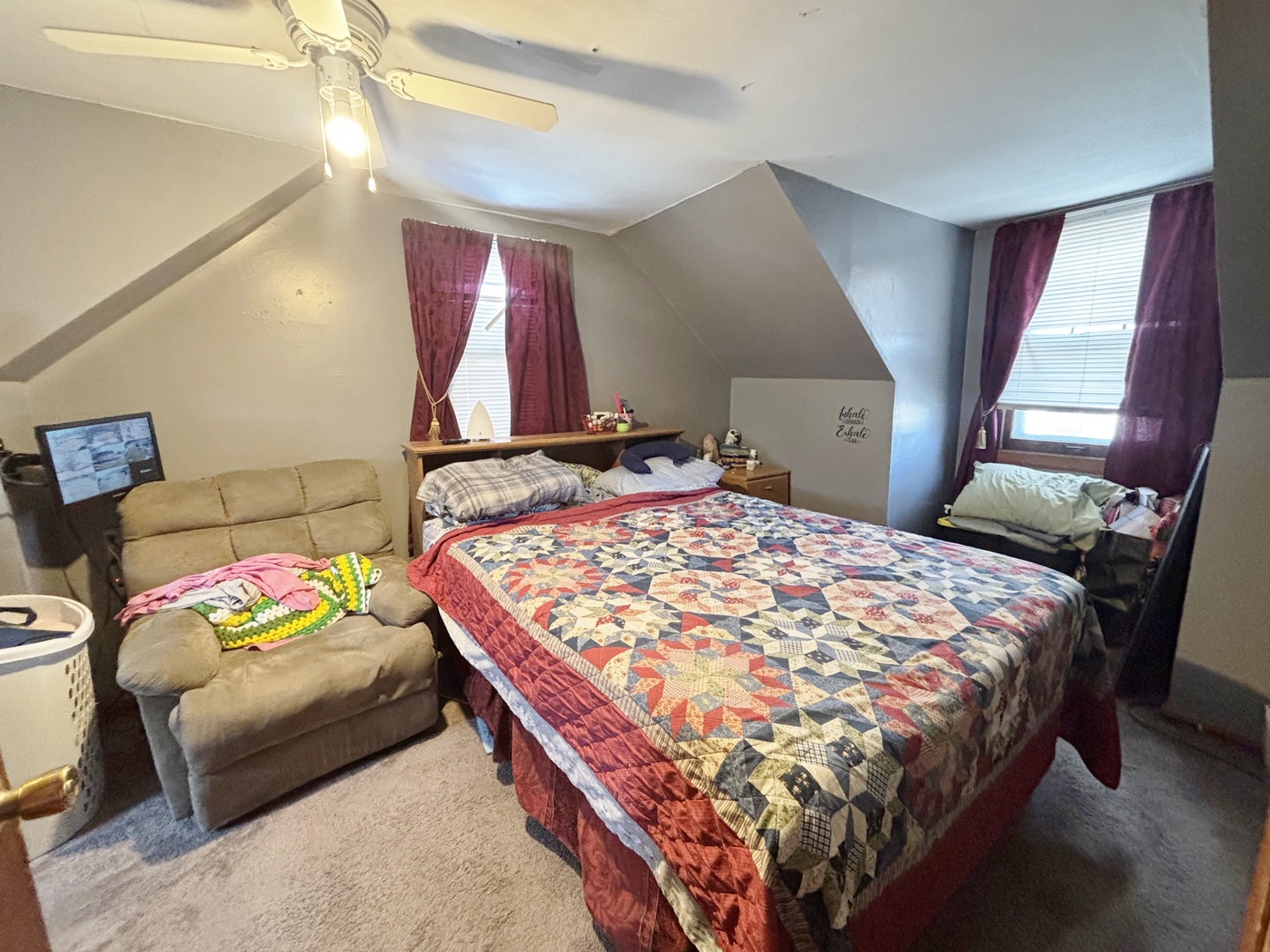 751 21st Street East Moline, IL 61244 - Photo 8 of 21 a bedroom with a bed a window and dresser