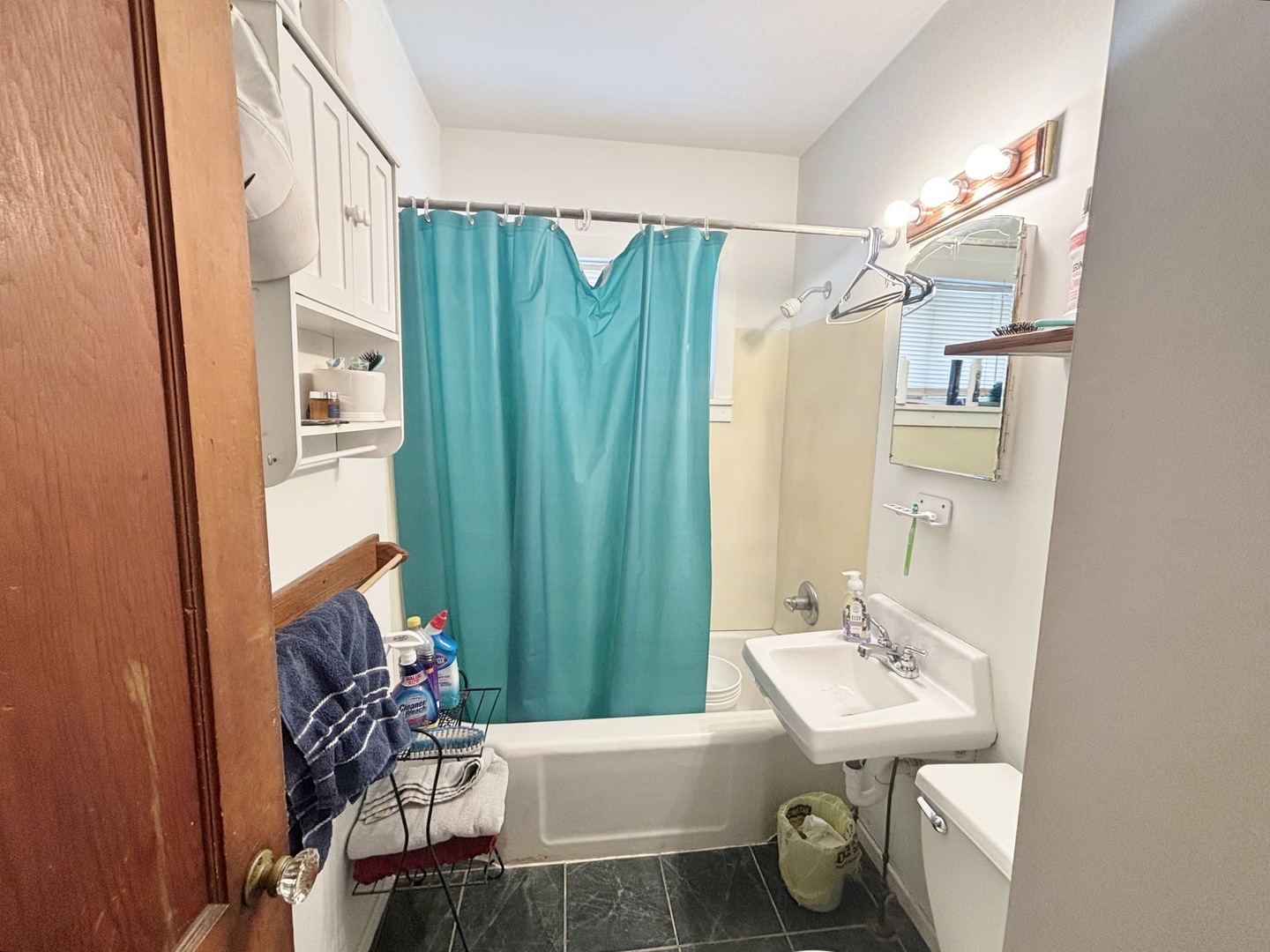 751 21st Street East Moline, IL 61244 - Photo 10 of 21 a bathroom with a sink toilet and shower