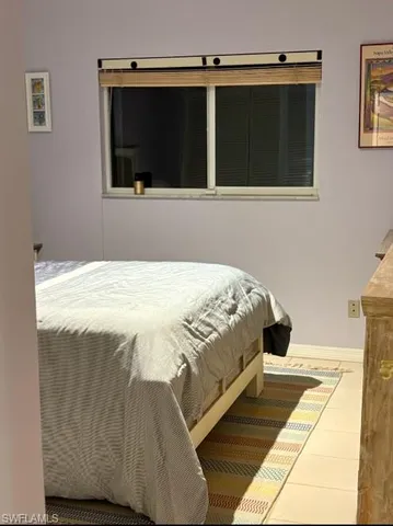 a bathroom with a toilet a sink and bathtub