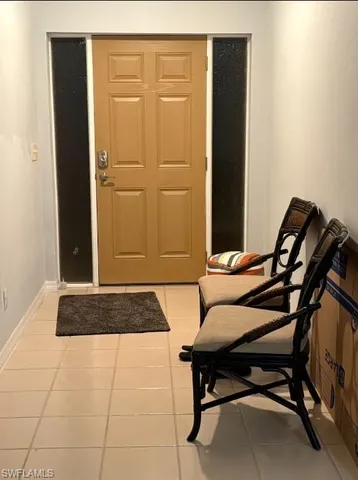 a bedroom with a bed and a cabinets