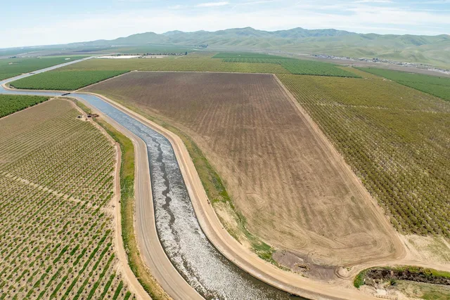 a view of swimming pool from a balcony