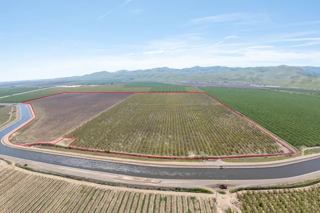 a view of swimming pool from a balcony