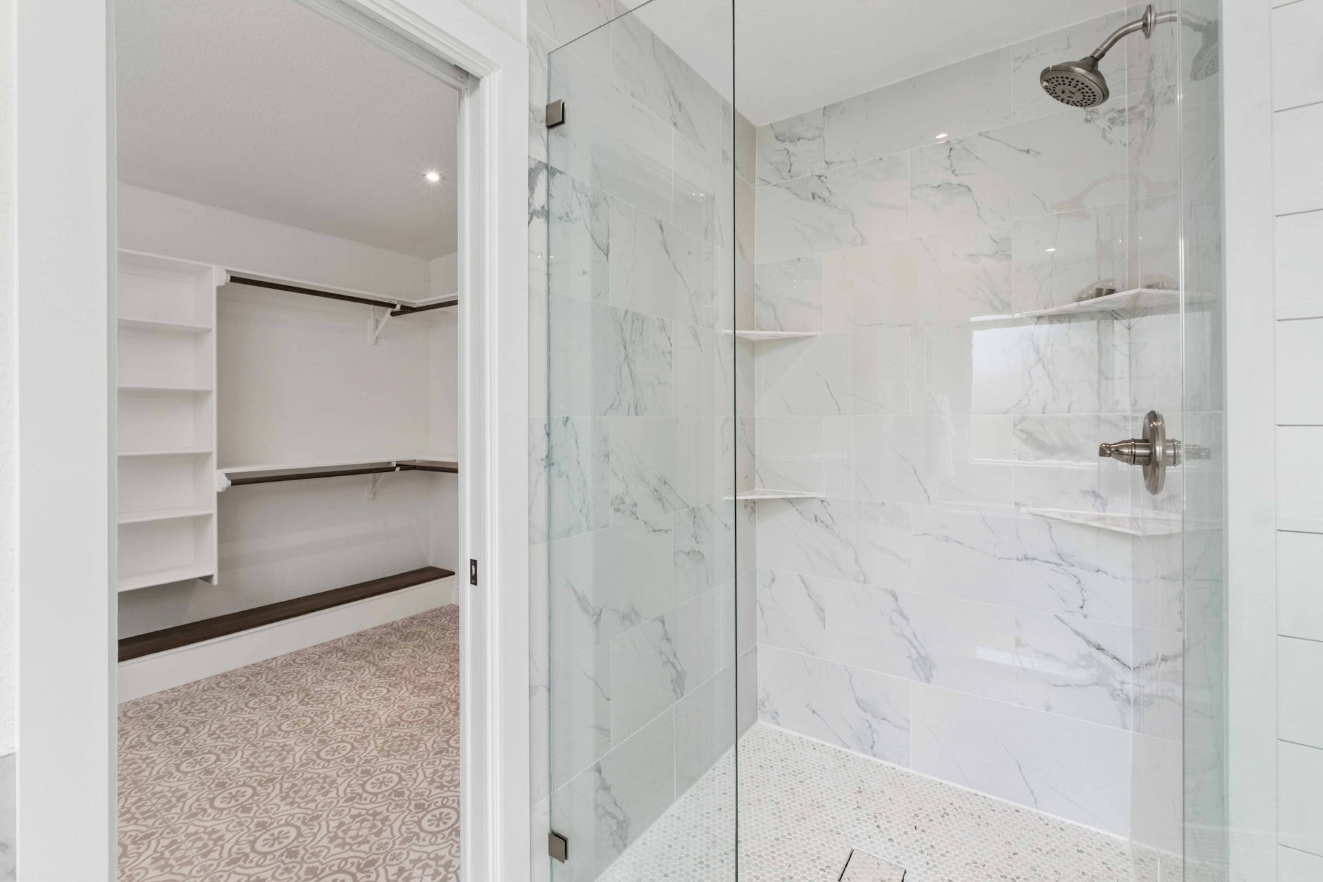 13207 Fencerail Road Manchaca, TX 78652 - Photo 13 of 36 Primary bathroom has a large walk in shower with 12 x 24 tile and plenty of shelf space