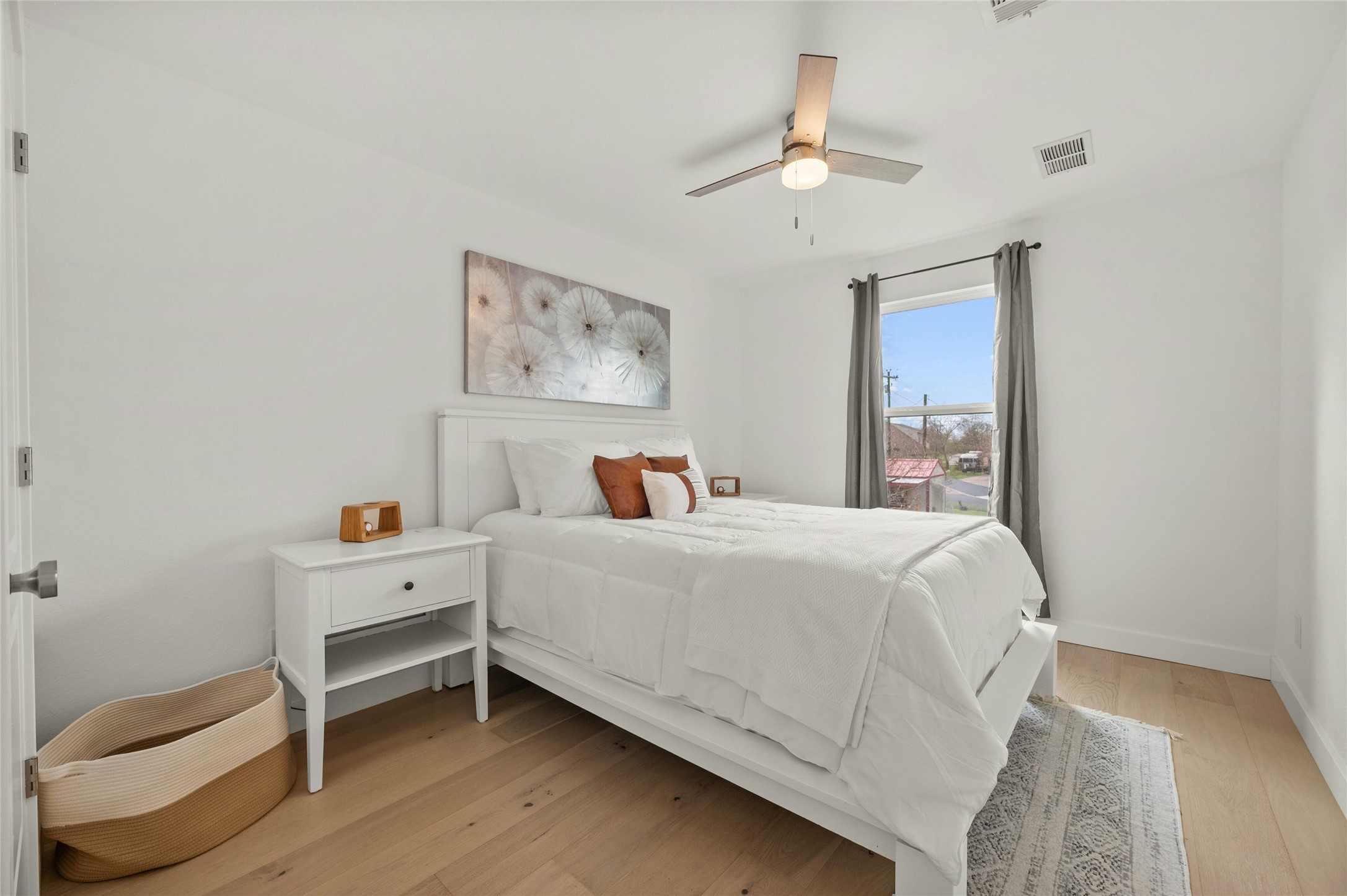 13207 Fencerail Road Manchaca, TX 78652 - Photo 21 of 36 Bedroom featuring white oak floors