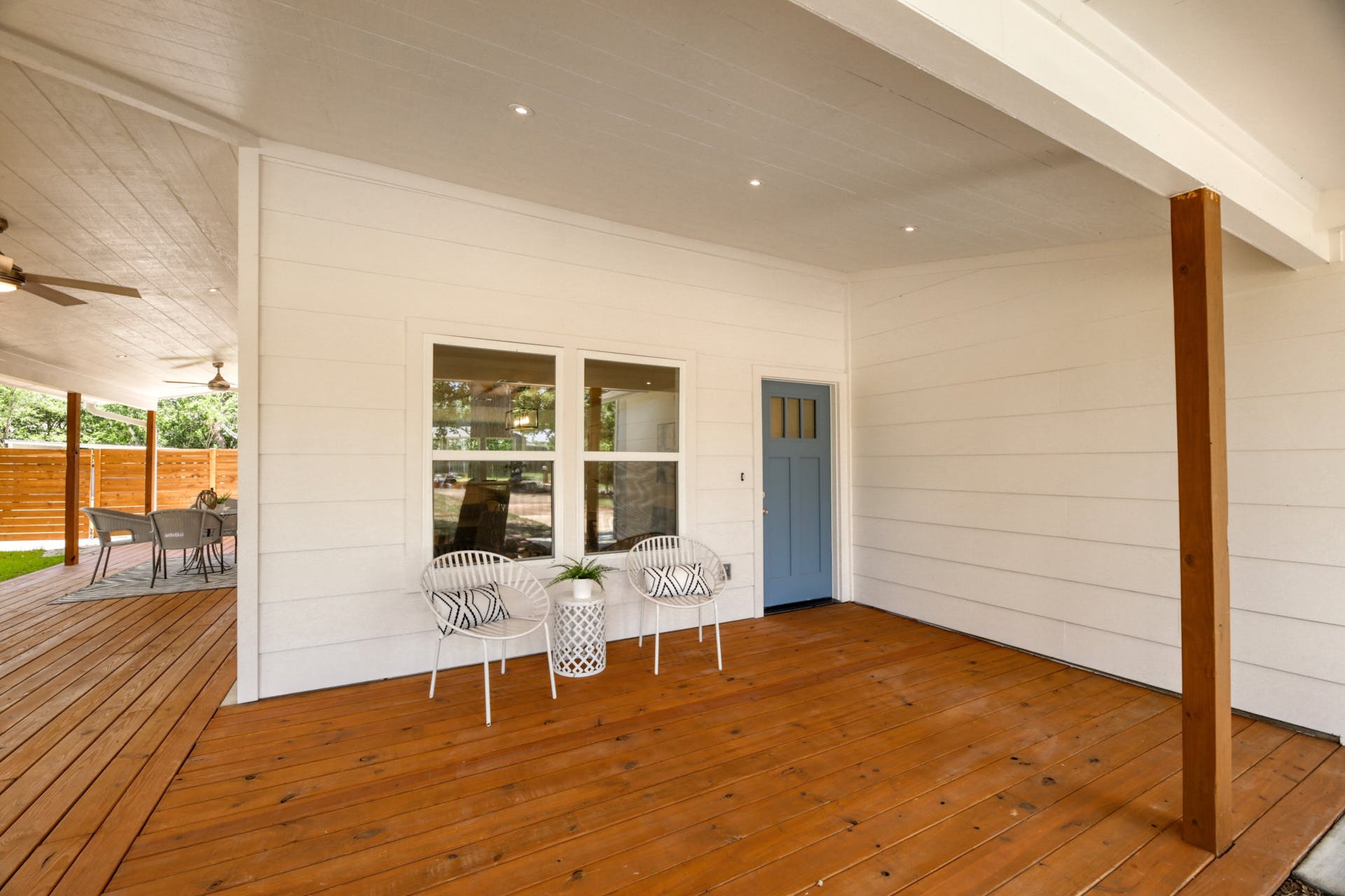 13207 Fencerail Road Manchaca, TX 78652 - Photo 31 of 36 Wooden terrace with outdoor dining space and ceiling fan