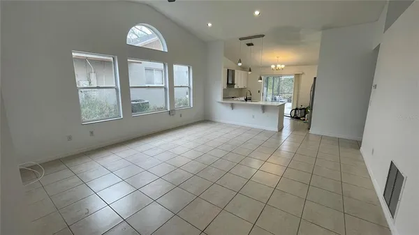 a view of a kitchen and window