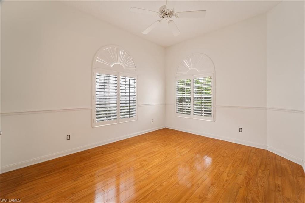 3956 Isla Ciudad Court Naples, FL 34109 - Photo 21 of 31 a view of an empty room with a window