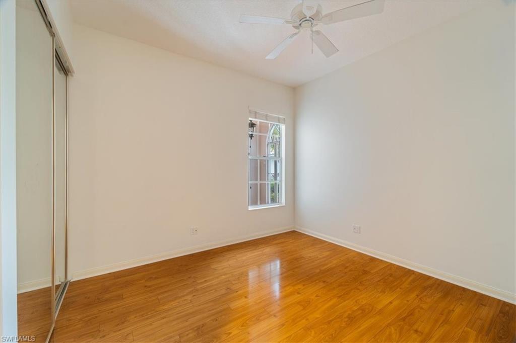 3956 Isla Ciudad Court Naples, FL 34109 - Photo 22 of 31 a view of an empty room with a window