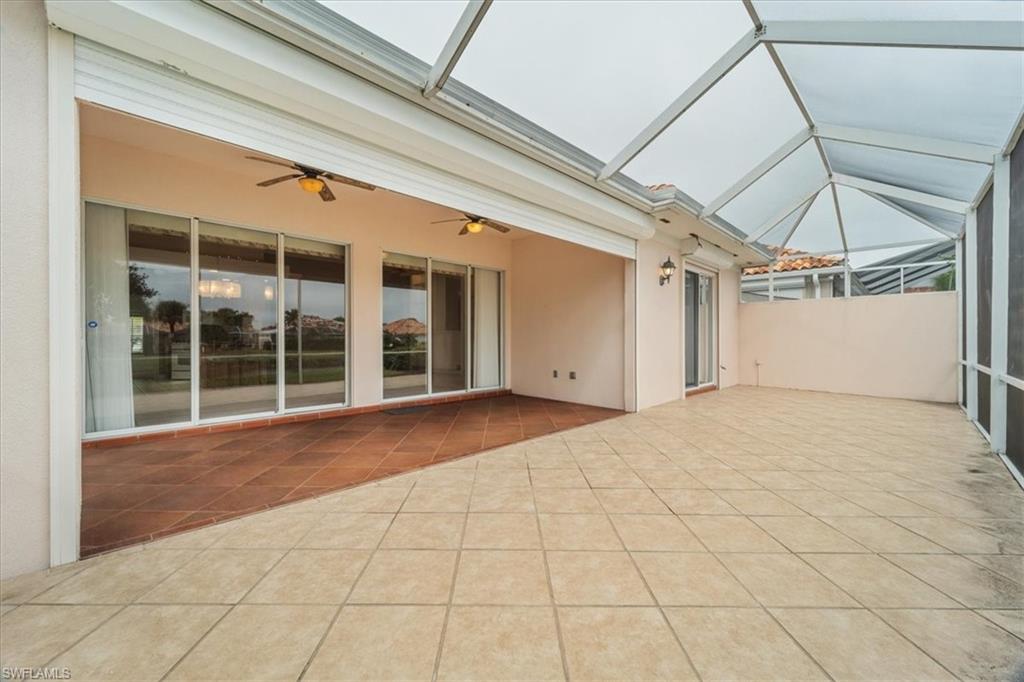 3956 Isla Ciudad Court Naples, FL 34109 - Photo 29 of 31 a view of empty room with windows