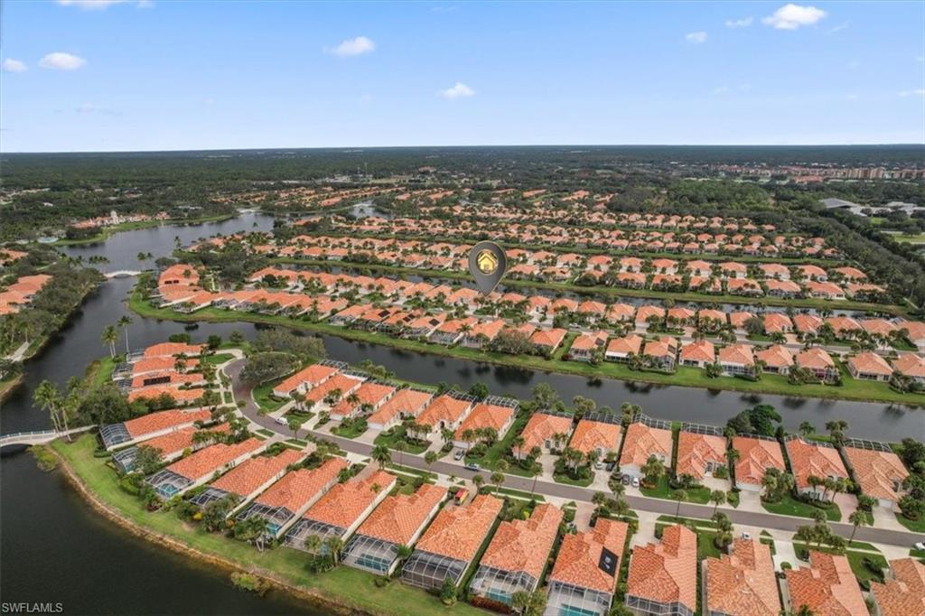 3956 Isla Ciudad Court Naples, FL 34109 - Photo 31 of 31 an aerial view of residential houses with outdoor space