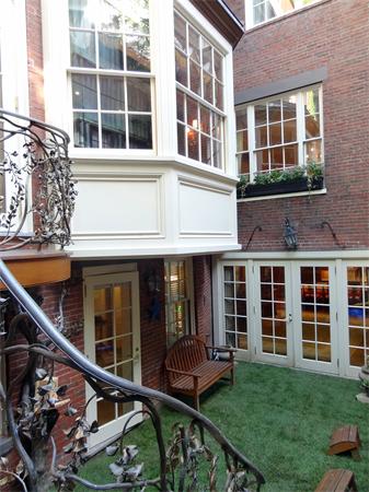 51 Chestnut Street Boston, MA 02108 - Photo 5 of 14 a balcony with a table and chairs