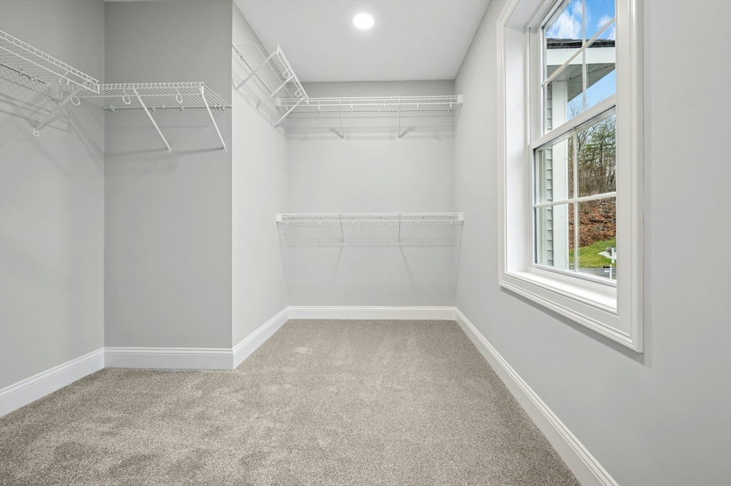 2 A Wilson Road, Unit A Millbury, MA 01527 - Photo 13 of 26 a view of an empty room with a window