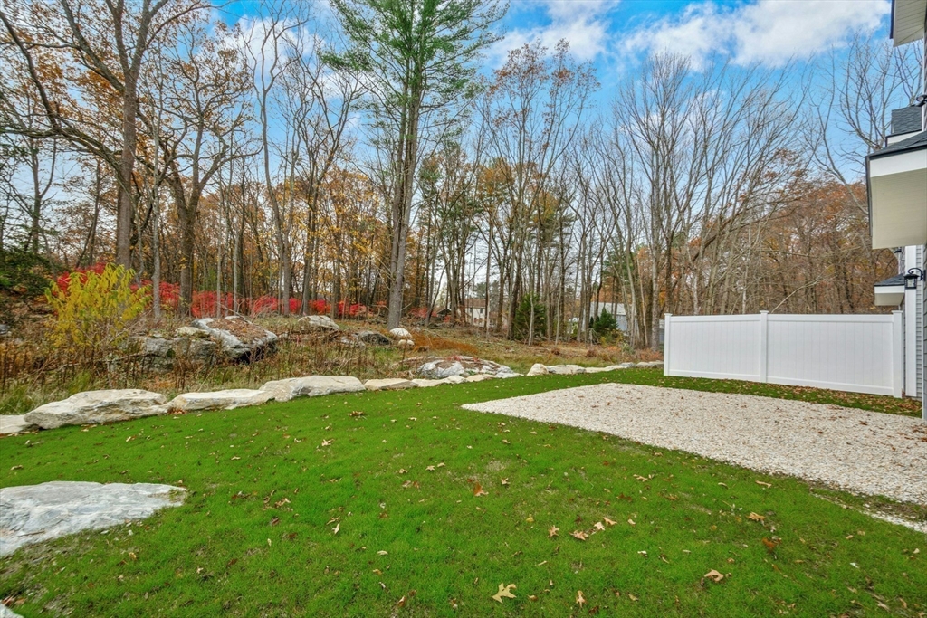 2 A Wilson Road, Unit A Millbury, MA 01527 - Photo 21 of 26 a view of backyard with green space
