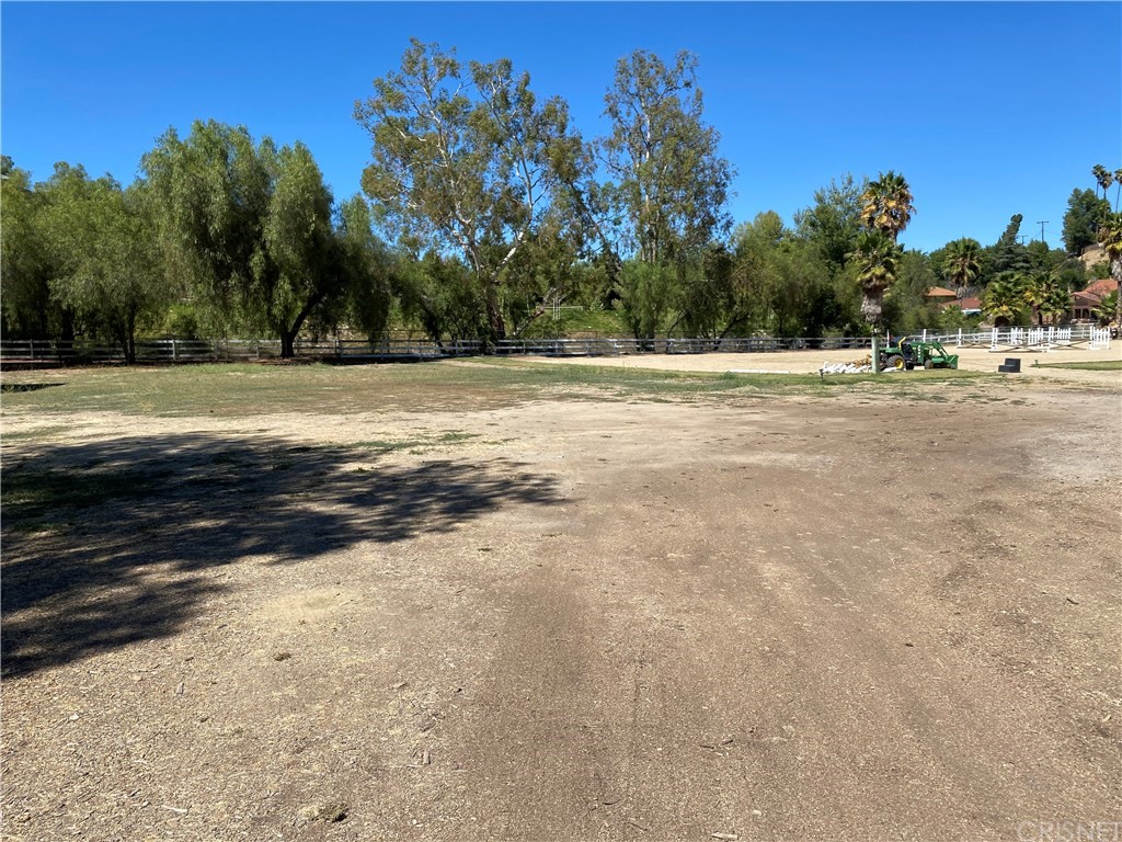5547 Paradise Valley Road Hidden Hills, CA 91302 - Photo 1 of 1 a view of swimming pool with large trees