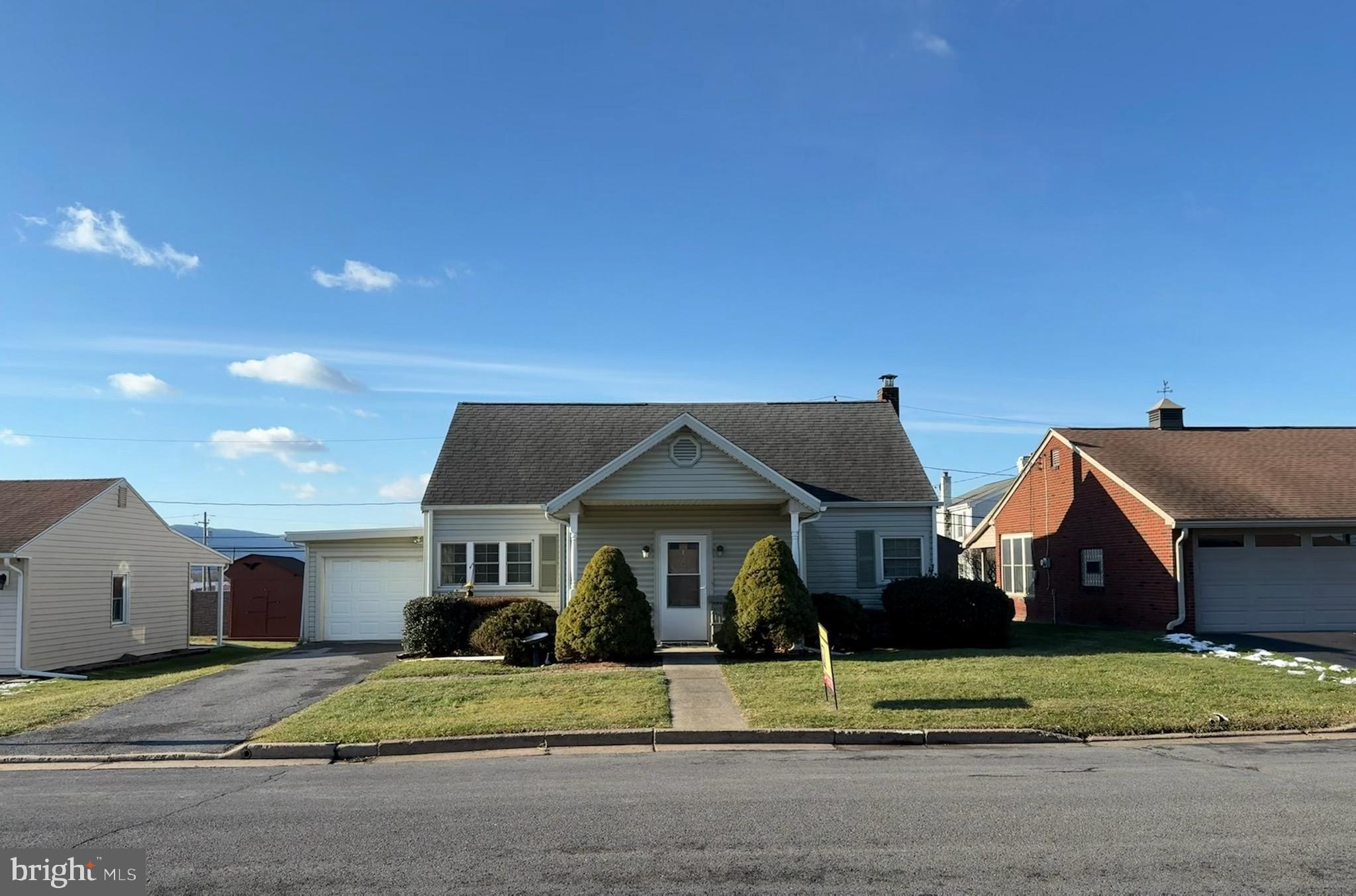 205 Rose Street Lock Haven, PA 17745 - Photo 1 of 25 a front view of a house with a garden