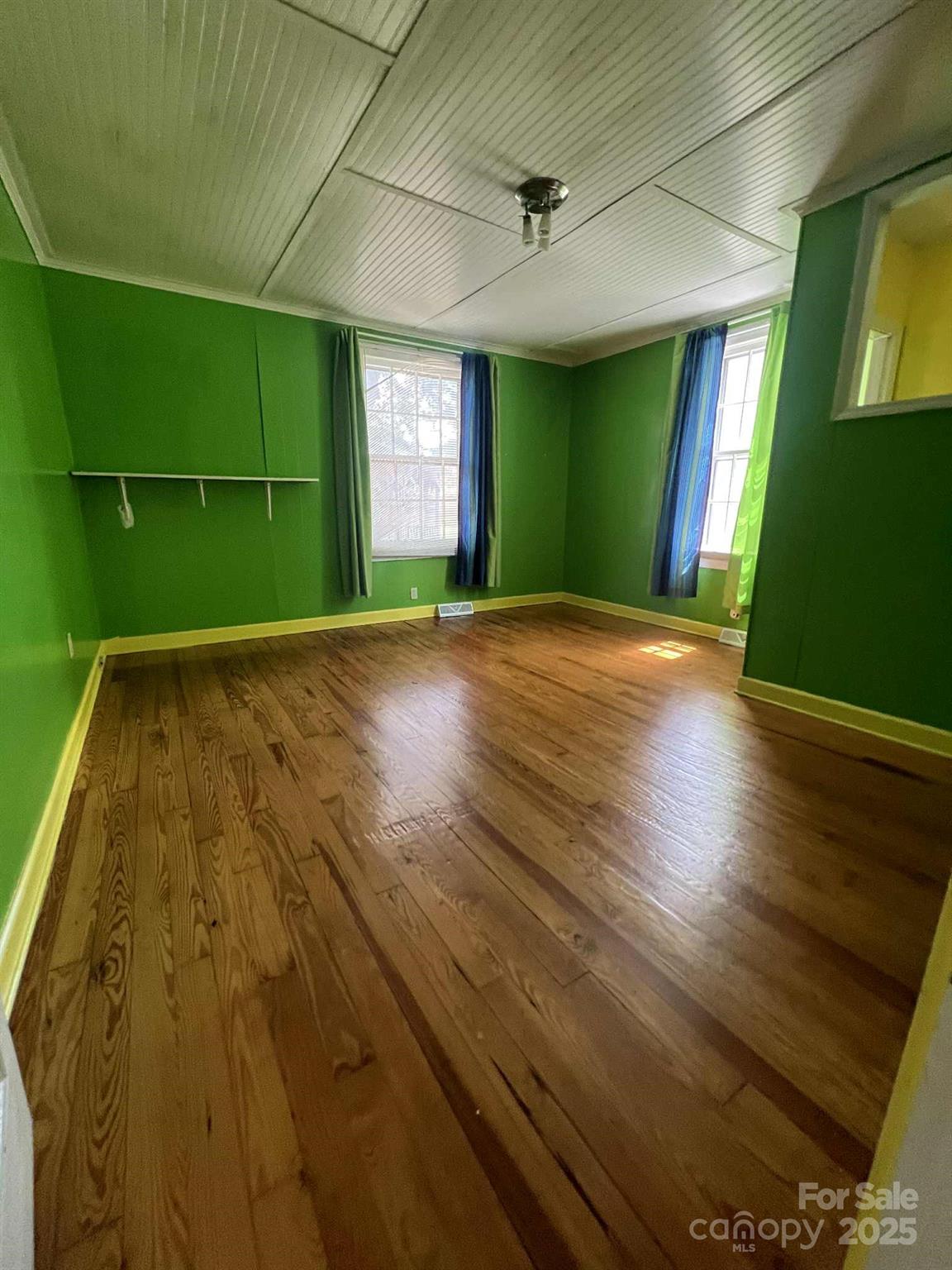 651 Still Street Chester, SC 29706 - Photo 17 of 27 a view of empty room with window and fan