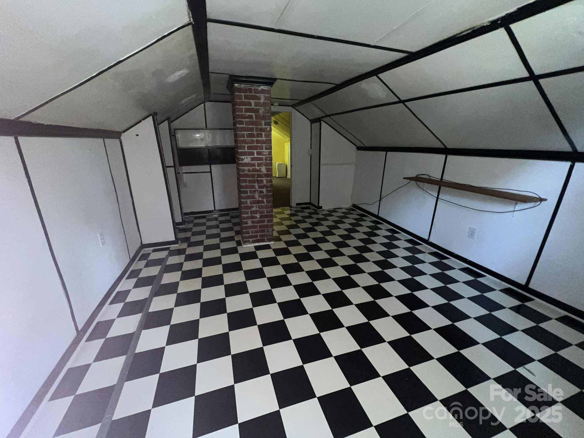 651 Still Street Chester, SC 29706 - Photo 23 of 27 a black and white checkered floor