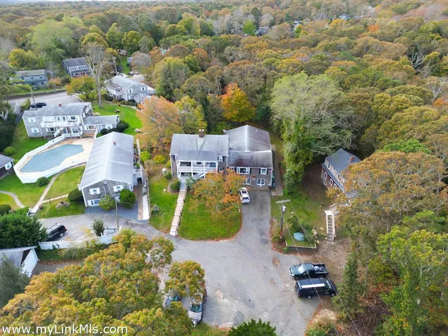 an aerial view of a house with a garden