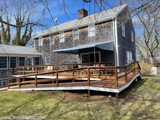 a view of a house with a large window
