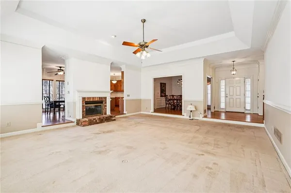a kitchen with wooden cabinets a sink and a stove