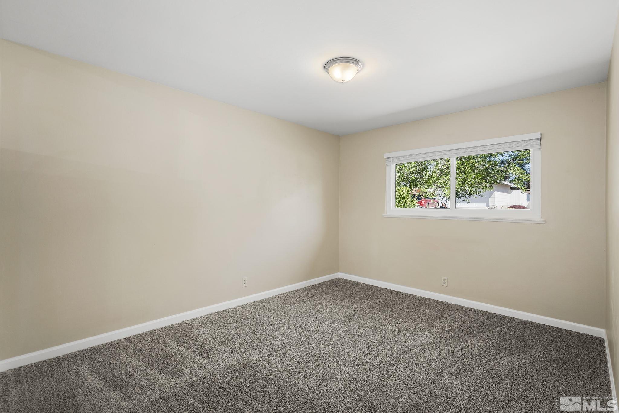 2050 Brisbane Avenue Reno, NV 89503 - Photo 21 of 24 an empty room with a window