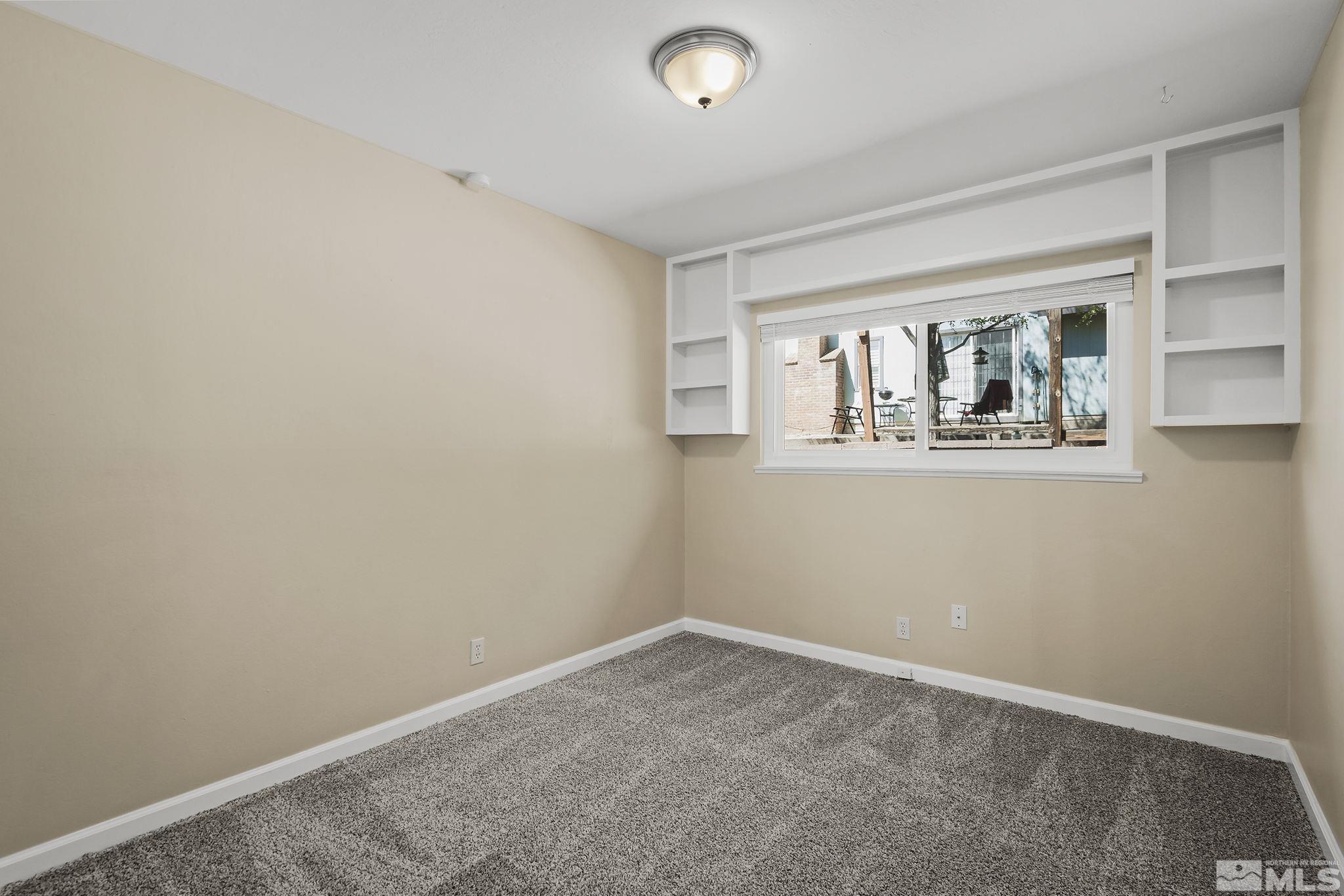 2050 Brisbane Avenue Reno, NV 89503 - Photo 23 of 24 an empty room with a window