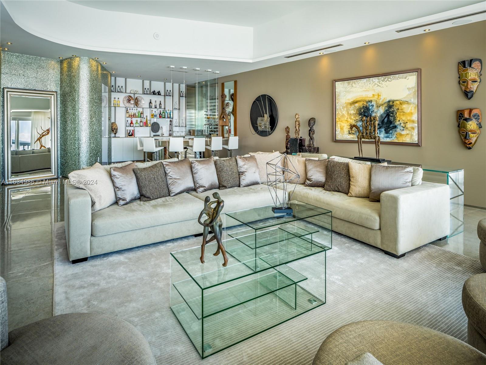 450 Alton Road, Unit PH1 Miami Beach, FL 33139 - Photo 25 of 50 a living room with furniture and a large window