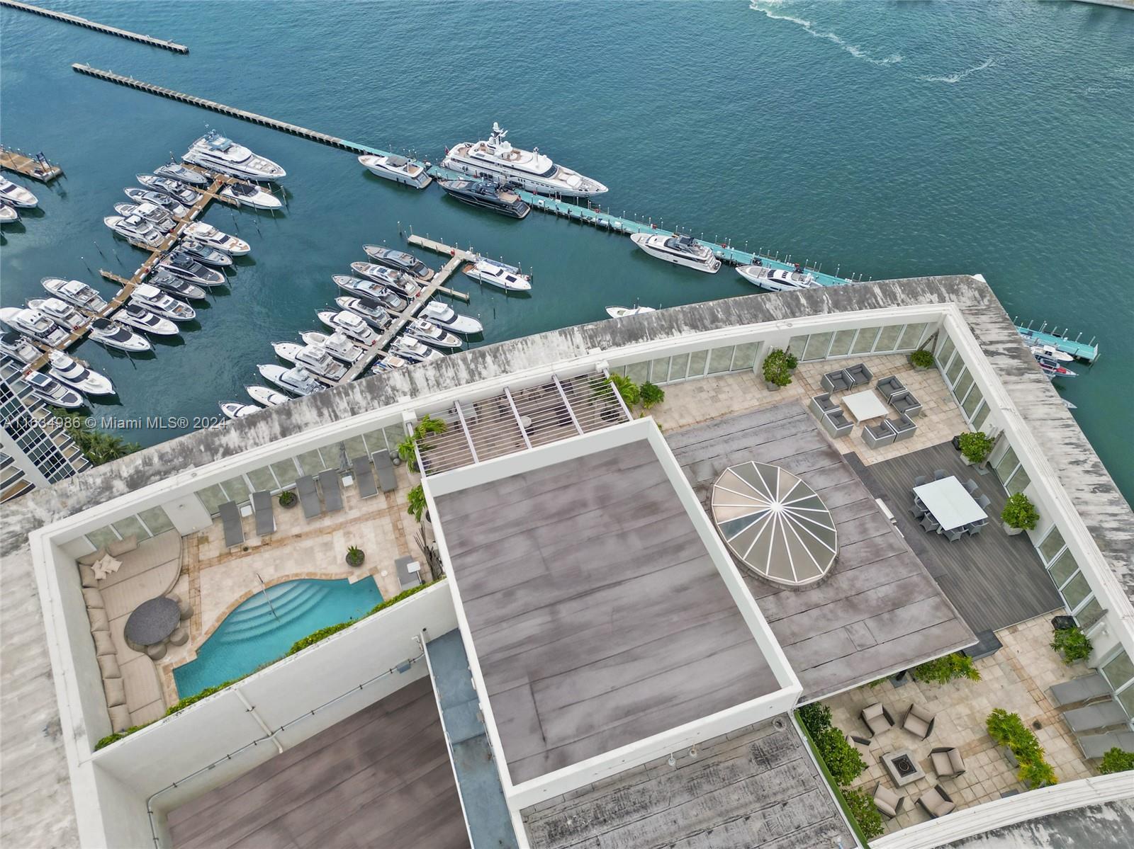 450 Alton Road, Unit PH1 Miami Beach, FL 33139 - Photo 30 of 50 an aerial view of a dining room with furniture
