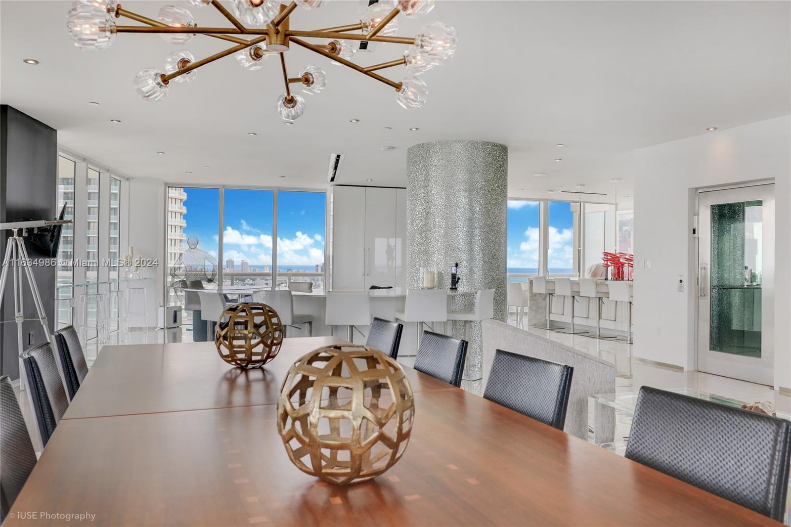450 Alton Road, Unit PH1 Miami Beach, FL 33139 - Photo 37 of 50 a living room with furniture and wooden floor
