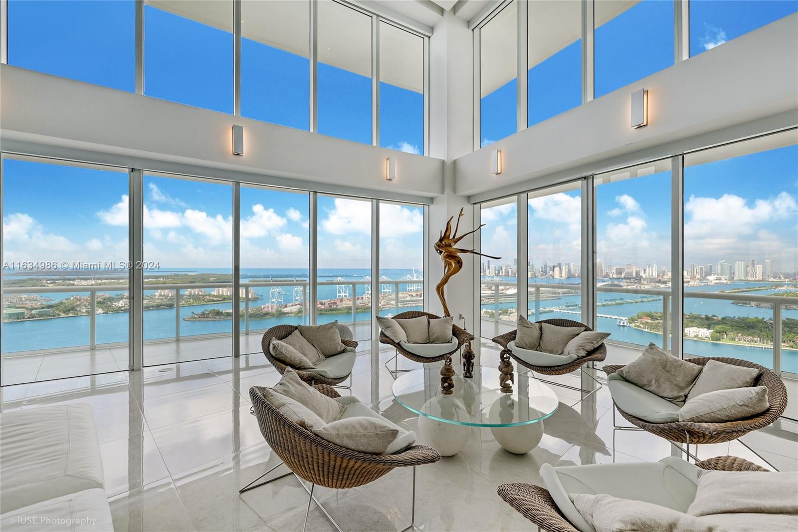 450 Alton Road, Unit PH1 Miami Beach, FL 33139 - Photo 41 of 50 a living room with furniture and a large window