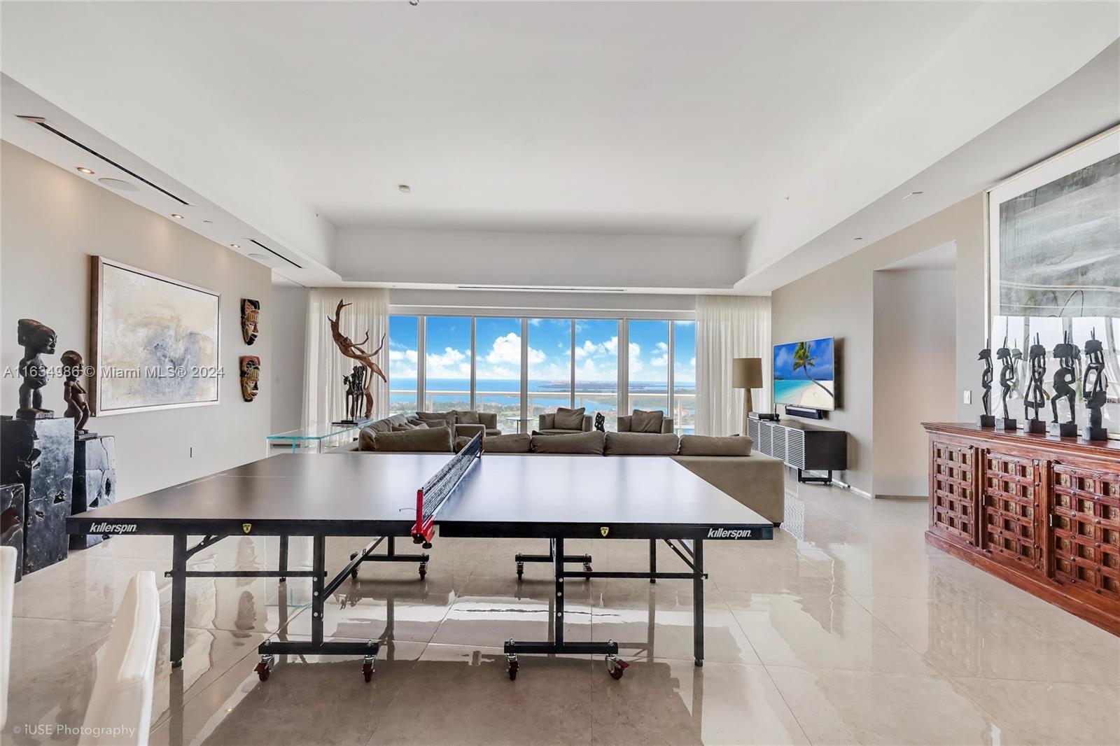 450 Alton Road, Unit PH1 Miami Beach, FL 33139 - Photo 43 of 50 a dining room with furniture and window