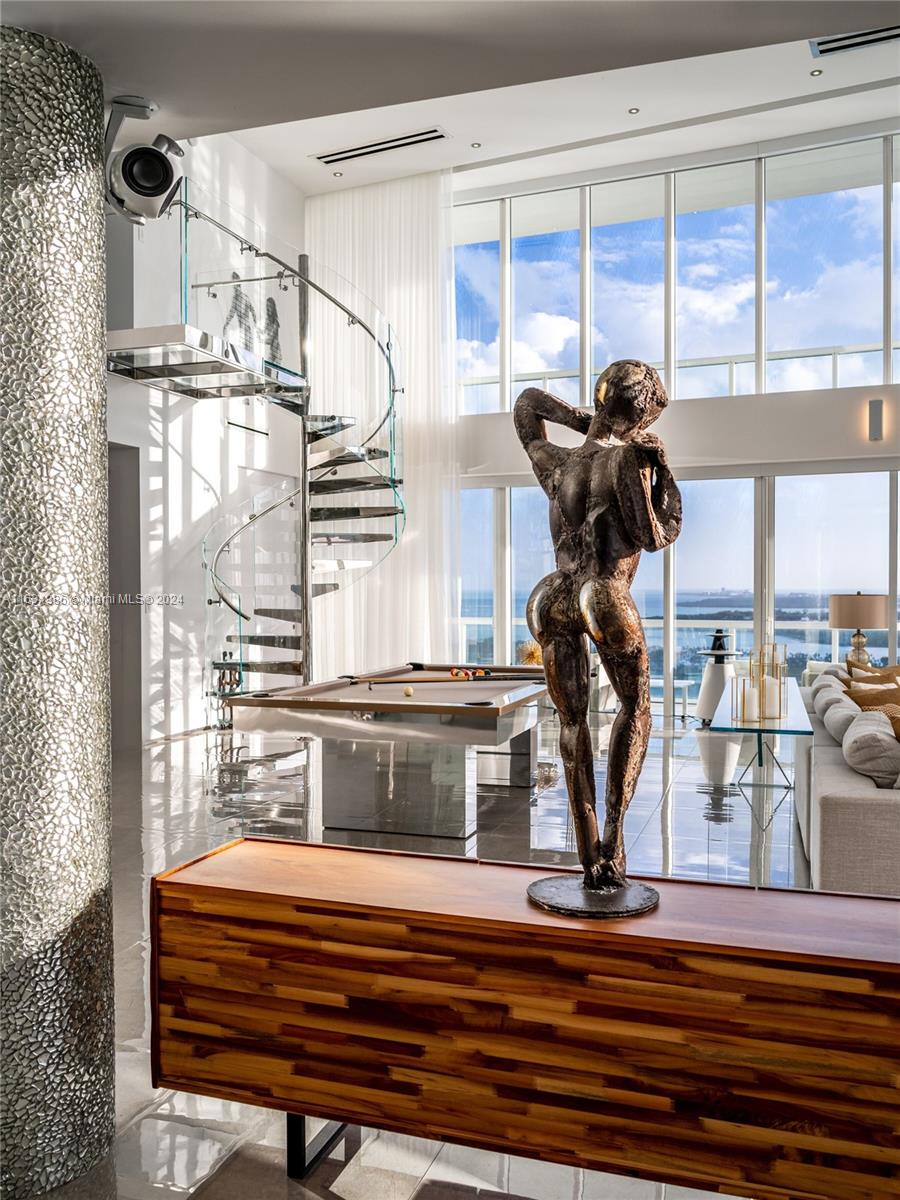 450 Alton Road, Unit PH1 Miami Beach, FL 33139 - Photo 9 of 50 a view of entryway and hall with wooden floor