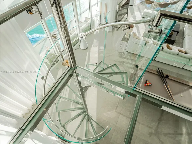 a picture of a bathroom with a shower and mirror