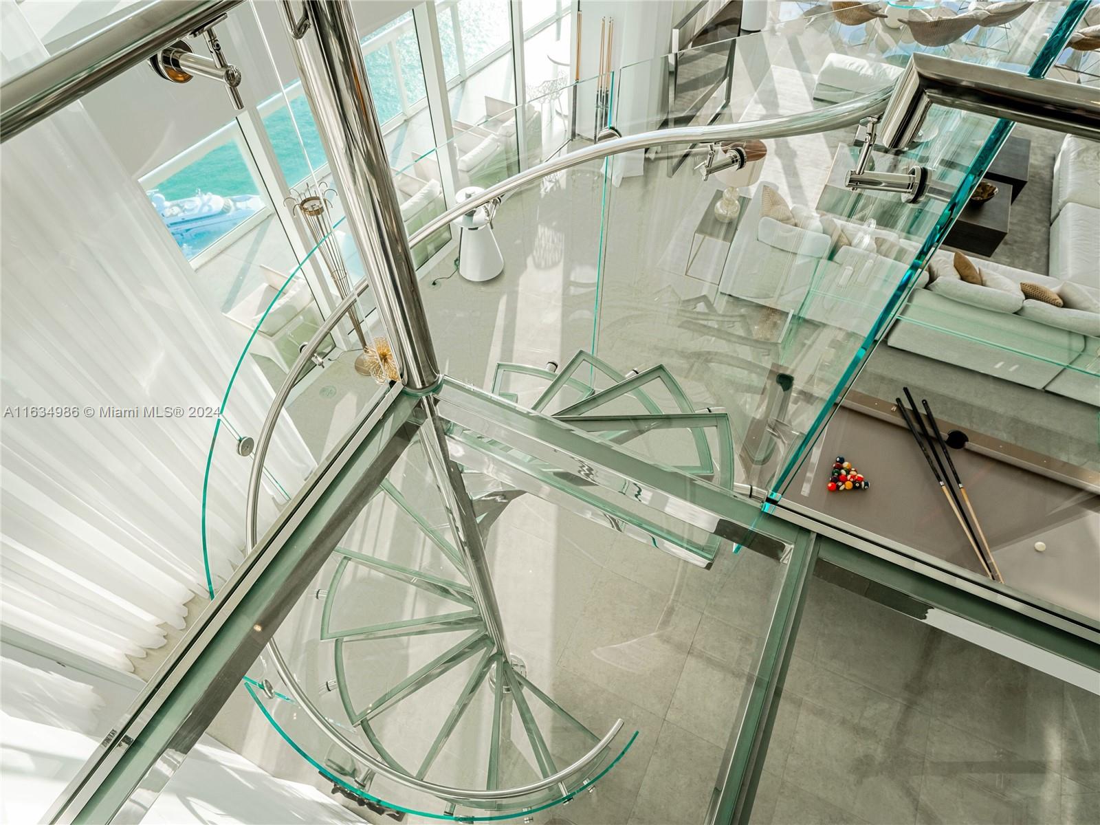 450 Alton Road, Unit PH1 Miami Beach, FL 33139 - Photo 10 of 50 a picture of a bathroom with a shower and mirror