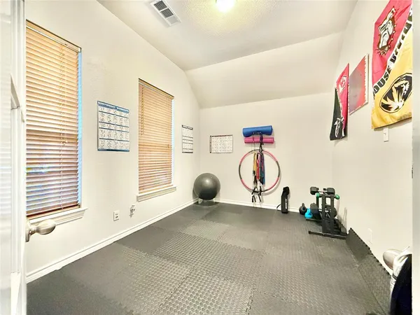 a view of a room with gym equipment