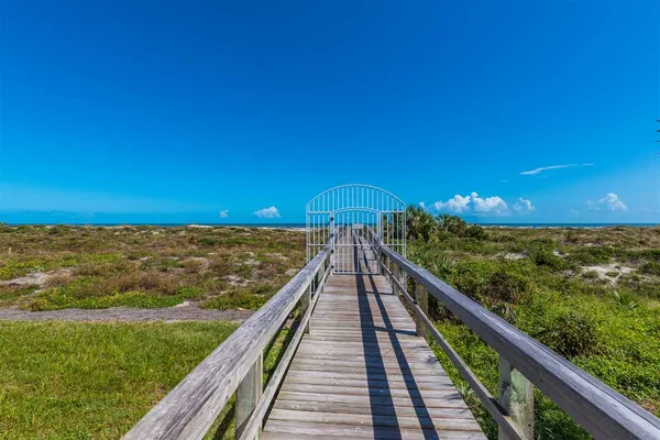 a view of a balcony with an ocean