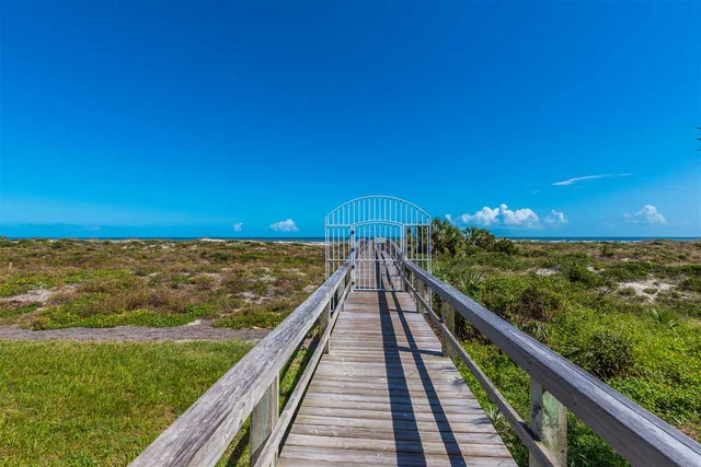 a view of a balcony with an ocean